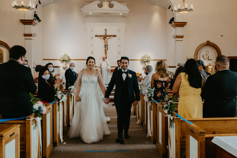 Bride and groom walk down the aisle (recessional)