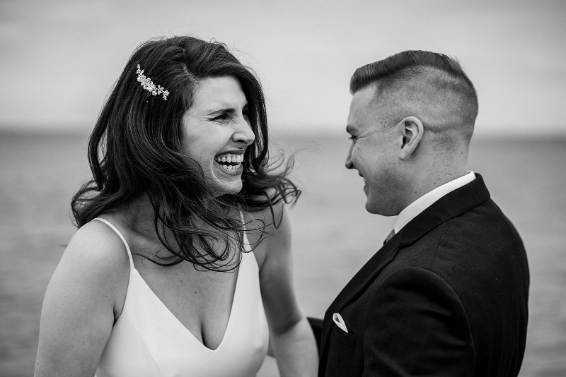 black and white beach wedding photos with bride and groom 
