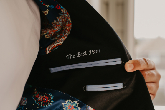 groom embroidered note on tux "the best part"